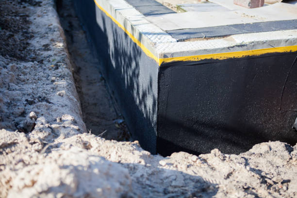 Professional Waterproofing technician working in Abingdon, MD